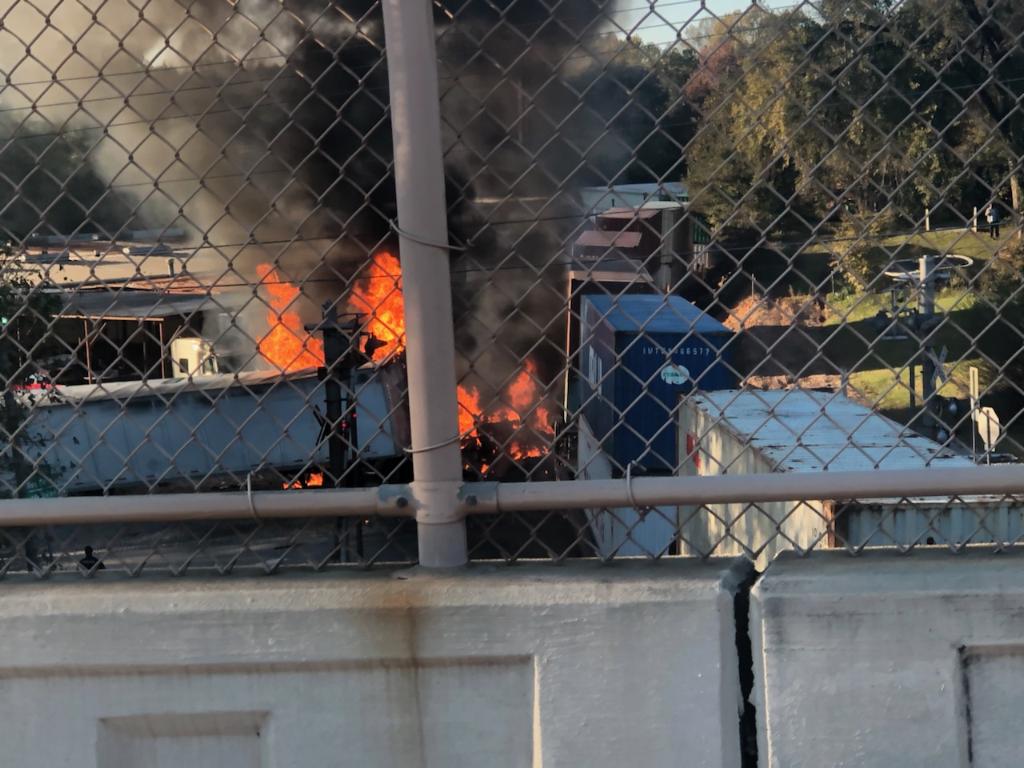 18-wheeler struck by train, bursts into flames